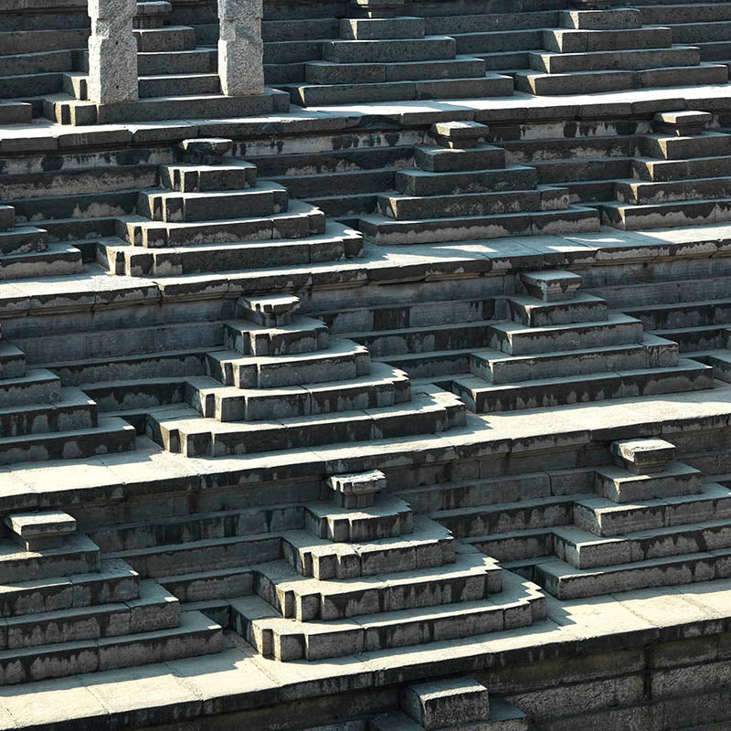 Hampi - Eternal Echoes: Shadows and Stone in Hampi's Geometric Step (with Frame)