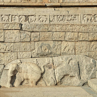 Hampi - Stories carved in stone near Mahanavmi Dibba. A Unesco World Heritage Site (with Frame)