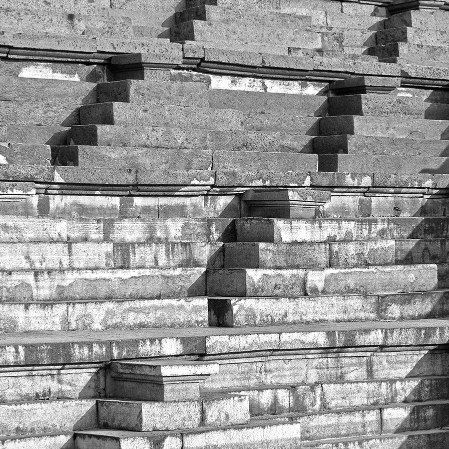 Step well carved in a stone. Hampi, a World Heritage Site situated in  Karnataka, India. (0132) This is located at Mahanavmi Dibba, Hampi. Indian Heritage, Art and Culture.   A beautiful composition of the steps, pattern and beautiful play of light and shadows. This Fine Art Photograph is printed on Canvas.  Fine Art Photography on Canvas Printing Indian Temples Fine Art Culture Carving Stone Black and White black&white B&W World Heritage Site BW Hampi Abstract